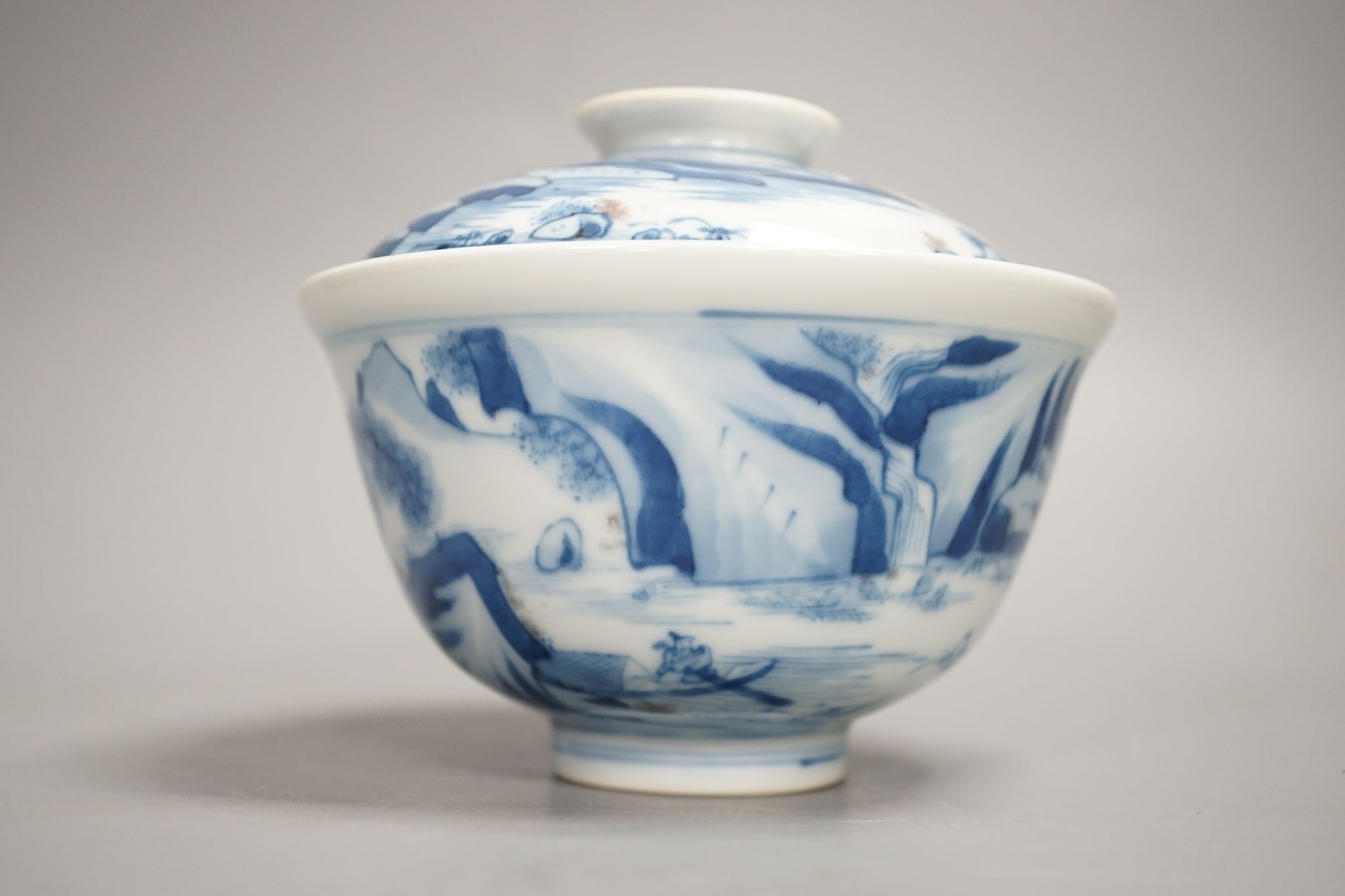 A Chinese underglaze blue and copper red bowl and cover, with hallmark, 9.5 cms high including cover.